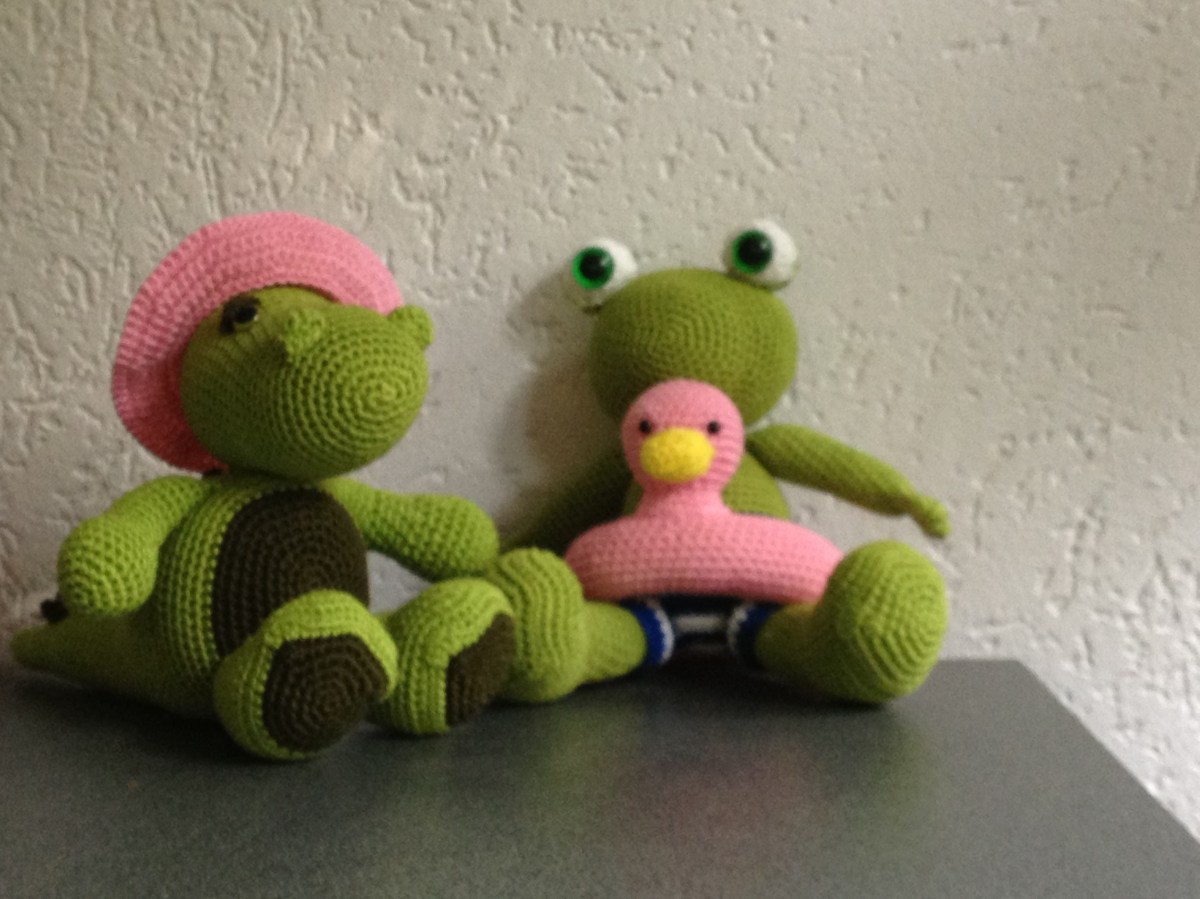 Alligator en kikker met zwemband